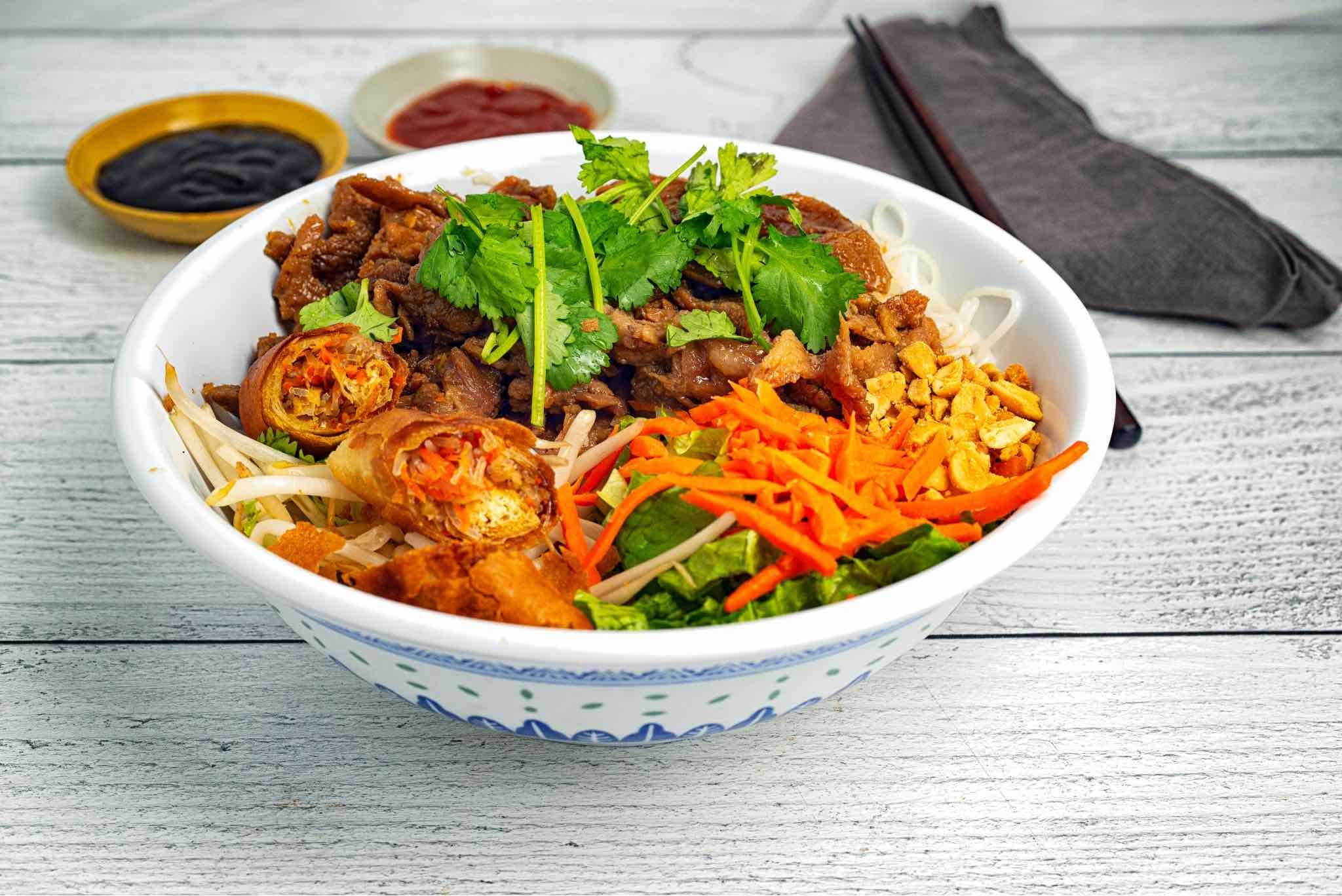 Bun with charbroiled pork & eggrolls